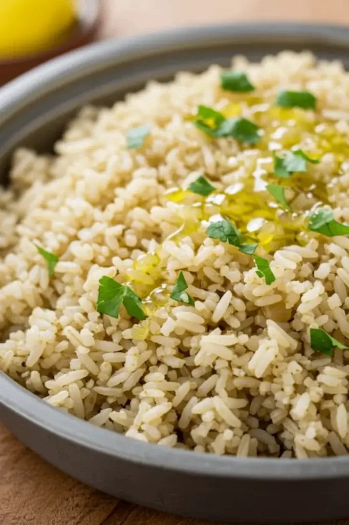 Brown Basmati Rice: 5 Ultimate Tips for Perfect Results Bowl of cooked Brown Basmati Rice drizzled with olive oil and garnished with parsley